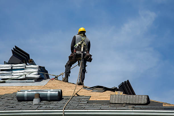 Professional Gutter Installation technician working in Gilbertville, MA
